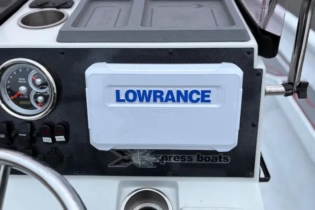 Slide: The Image of Console of 2024 Express H22B boat featuring Lowrance Elite system. - 17