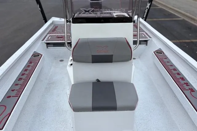 Slide: The Image of 2024 Express H22B boat interior with seating and measuring guides. - 21