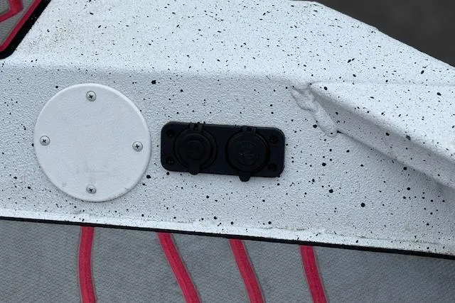 Slide: The Image of 2024 Express H22B boat detail with speckled finish and dual sockets. - 28