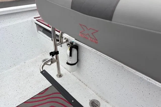 Slide: The Image of 2024 Express H22B boat interior with seating and safety equipment. - 36