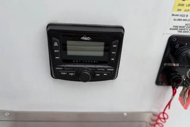 Slide: The Image of 2024 Express H22B audio control panel with Wet Sounds system. - 37