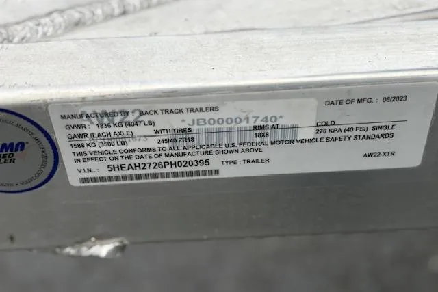 Slide: The Image of Label on Express H22B 2024 trailer showing specifications and manufacturing details. - 57