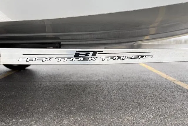 Slide: The Image of Back Track Trailers logo on Express H22B, 2024 model, parked on asphalt. - 63