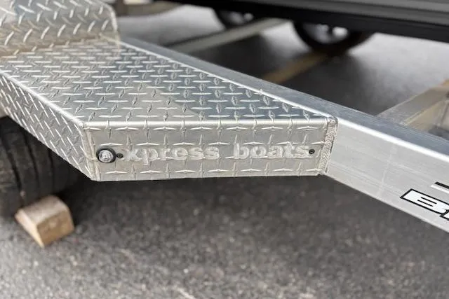 Slide: The Image of Aluminum boat trailer with "Express Boats" branding, 2024 Express H22B model. - 64