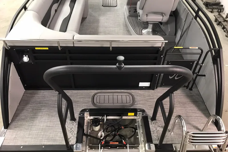 Slide: The Image of 2026 JC NEPTOON SPORT 21TT boat interior with seating and control area. - 15