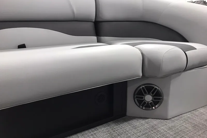 Slide: The Image of Luxurious seating on 2026 JC NEPTOON SPORT 21TT boat with integrated speaker system. - 22