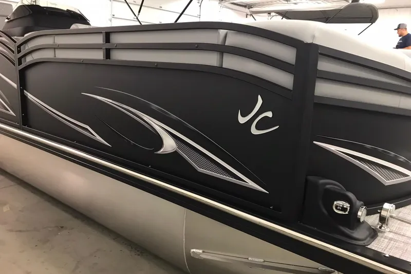 Slide: The Image of 2026 JC NEPTOON SPORT 21TT pontoon boat with sleek black and silver design. - 36