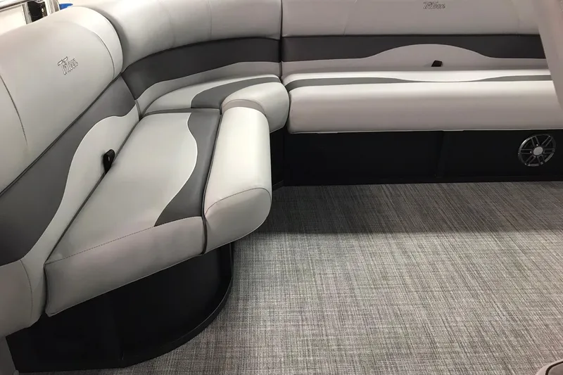 Slide: The Image of Luxurious seating in 2026 JC NEPTOON SPORT 21TT boat, featuring sleek gray upholstery. - 5