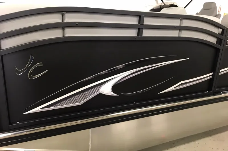 Slide: The Image of 2026 JC NEPTOON SPORT 21TT boat side view with sleek black and silver design. - 12