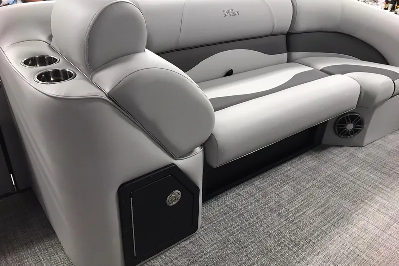 Slide: The Image of 2026 JC NEPTOON SPORT 21TT boat interior with gray seating and cup holders. - 20