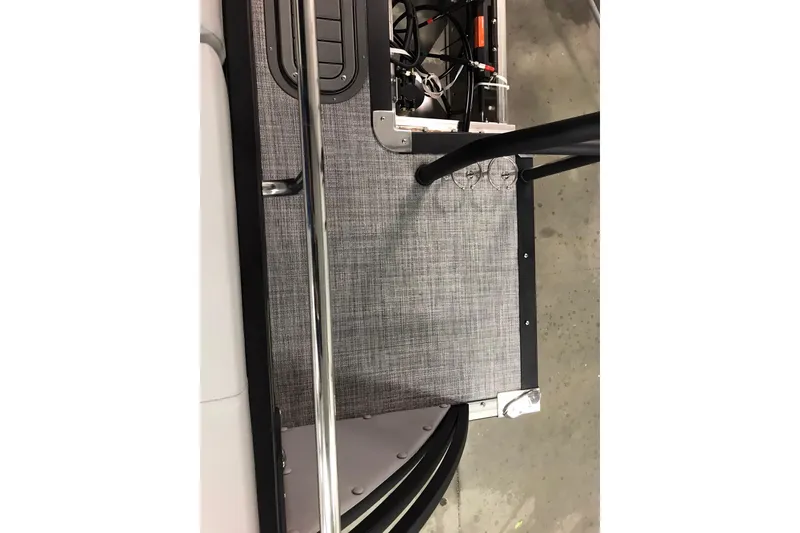 Slide: The Image of 2026 JC NEPTOON SPORT 21TT boat interior with sleek flooring and metal railing. - 35