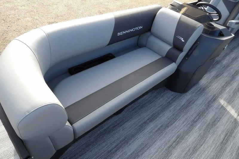 Slide: The Image of 2026 Bennington S 22 SSR boat interior with sleek gray seating and modern design. - 13