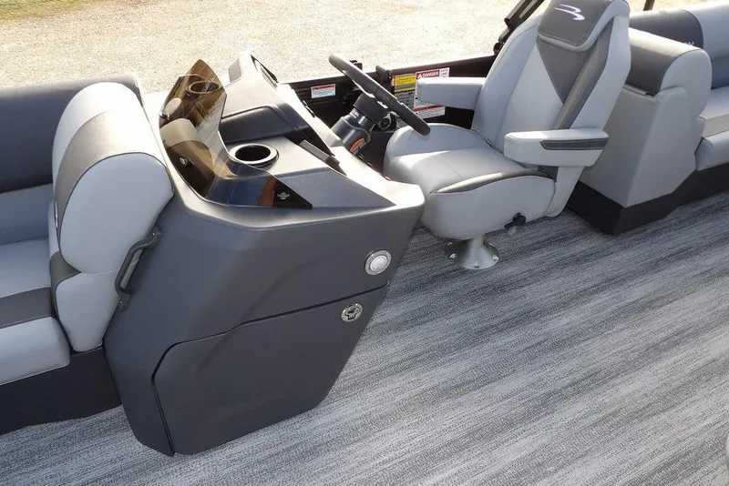Slide: The Image of 2026 Bennington S 22 SSR boat interior with modern helm and seating. - 14