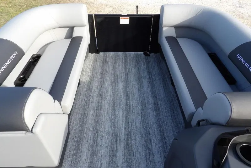 Slide: The Image of 2026 Bennington S 22 SSR boat interior with gray seating and flooring. - 15