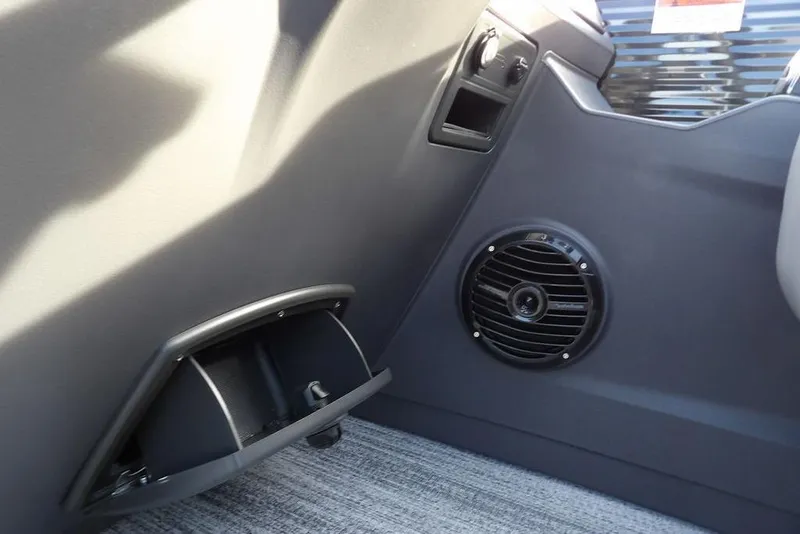 Slide: The Image of Interior view of 2026 Bennington S 22 SSR with speaker and storage compartment. - 22