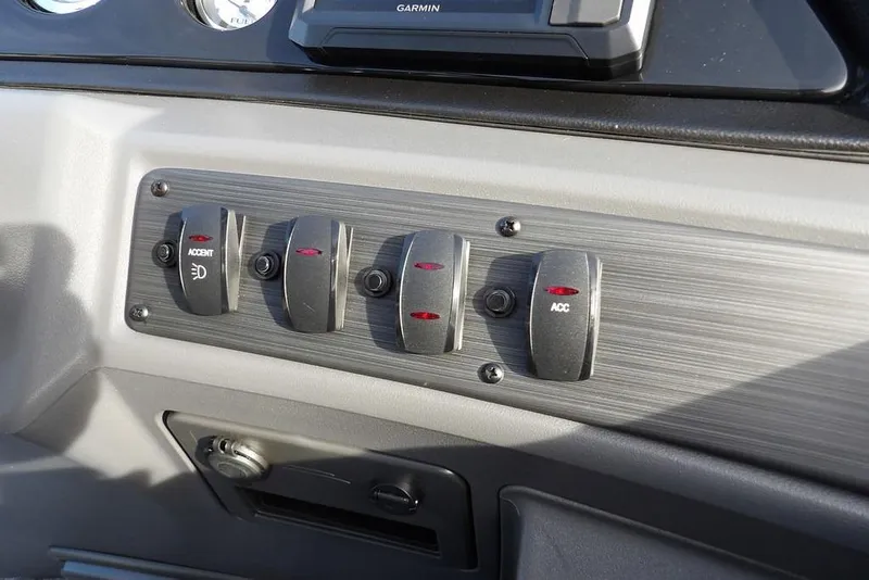 Slide: The Image of Dashboard switches on a 2026 Bennington S 22 SSR boat. - 26
