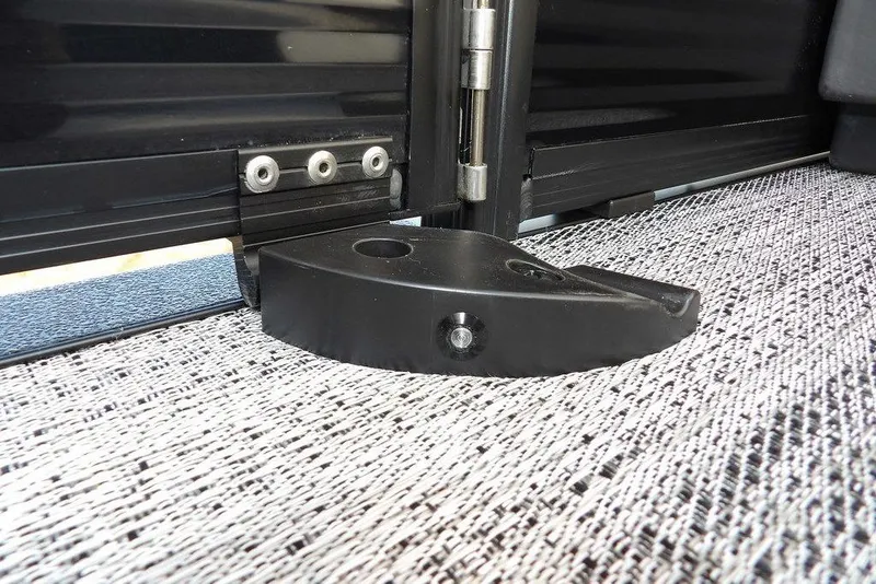 Slide: The Image of Close-up of a 2026 Bennington S 22 SSR boat hinge and latch mechanism. - 34