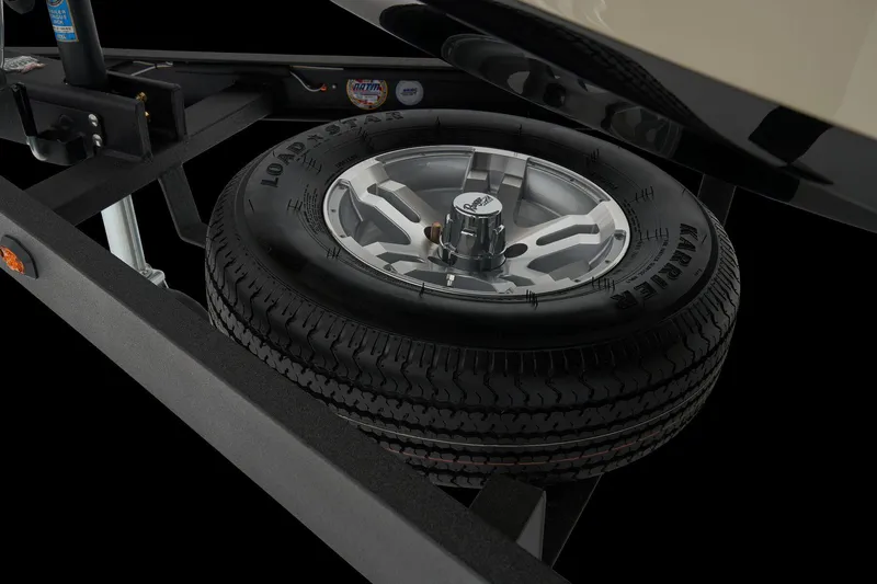 Slide: The Image of Manufacturer Provided Image: 2026 Ranger Z185 trailer with spare tire mounted on a black frame. - 17