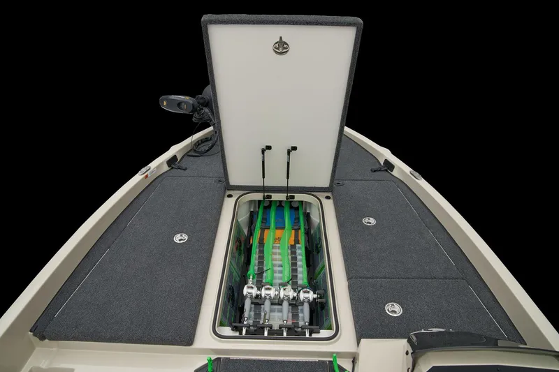 Slide: The Image of Manufacturer Provided Image: 2026 Ranger Z185 boat with open storage compartment, showcasing organized fishing rod holders. - 23