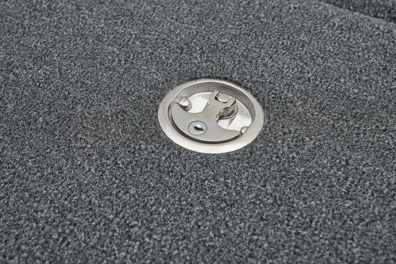 Slide: The Image of Manufacturer Provided Image: 2026 Ranger Z185 boat deck with a metal latch on gray carpet. - 33