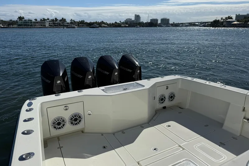 Slide: The Image of 2018 SeaVee 390Z boat with four Mercury outboard engines on a sunny day. - 24