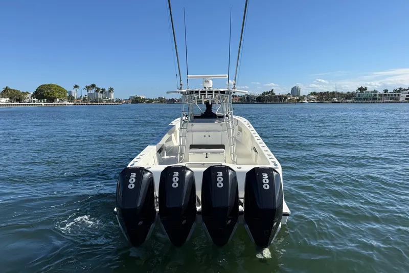 Slide: The Image of 2018 SeaVee 390Z boat with four 300 horsepower engines on the water. - 3