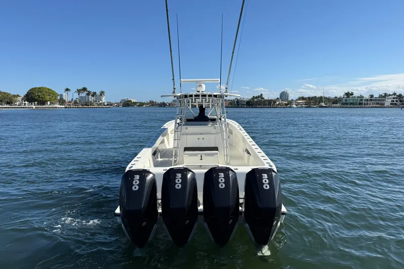 Slide: The Image of 2018 SeaVee 390Z boat with four 300 horsepower engines on a sunny day. - 34