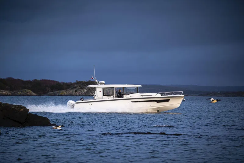 The Image of Nimbus Commuter 11 boat 2025 cruising on calm waters. - 1