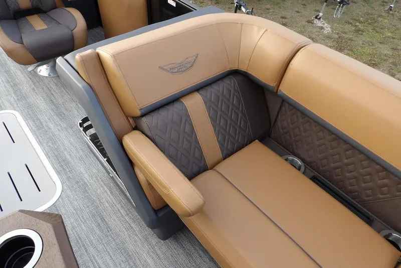 Slide: The Image of Luxurious seating on 2026 Bennington 22 MFB boat with brown and gray upholstery. - 13
