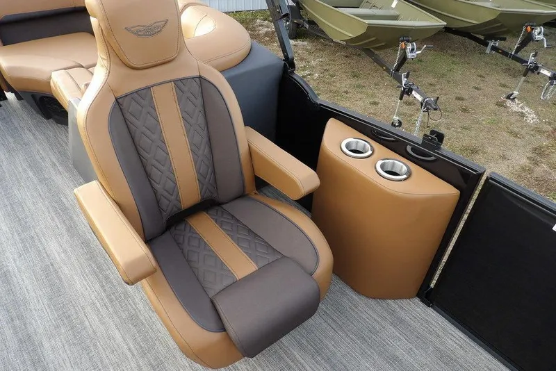 Slide: The Image of Luxurious seating on 2026 Bennington 22 MFB boat with cup holders and elegant design. - 19