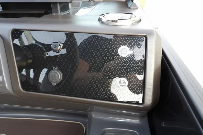 Slide: The Image of Dashboard of 2026 Bennington 22 MFB boat with modern controls and sleek design. - 26