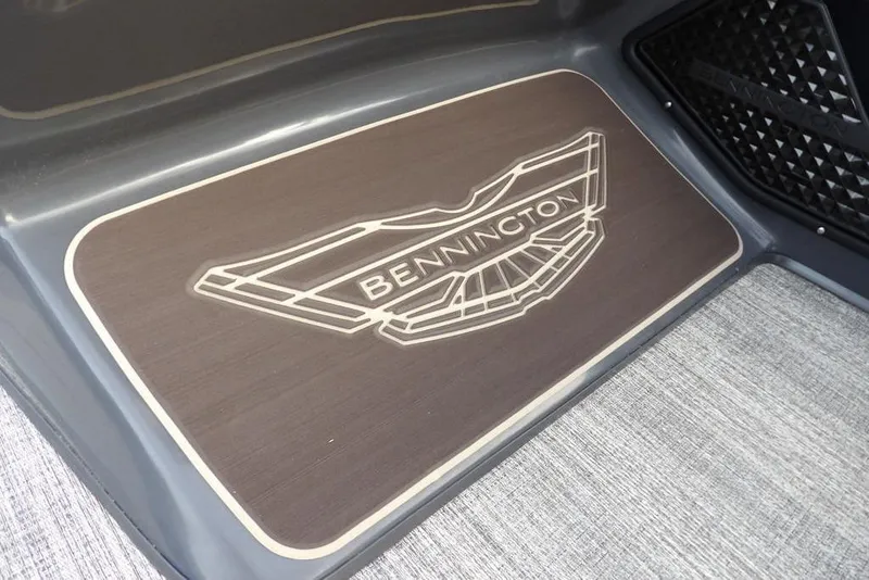 Slide: The Image of 2026 Bennington 22 MFB logo on boat flooring, featuring elegant design and craftsmanship. - 27