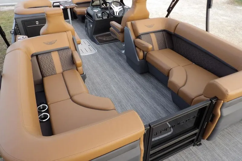 Slide: The Image of Luxurious interior of 2026 Bennington 22 MFB pontoon boat with tan seating and modern design. - 32