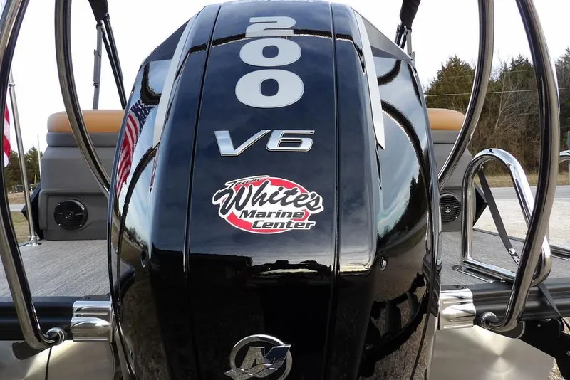 Slide: The Image of 2026 Bennington 22 MFB boat with 200 V6 engine, White's Marine Center logo. - 37