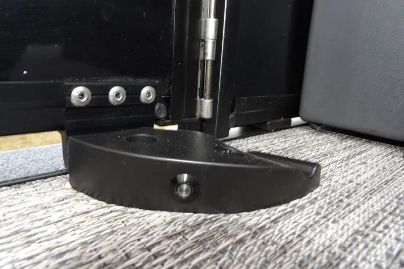 Slide: The Image of Close-up of a hinge mechanism on a 2026 Bennington 22 MFB boat. - 39