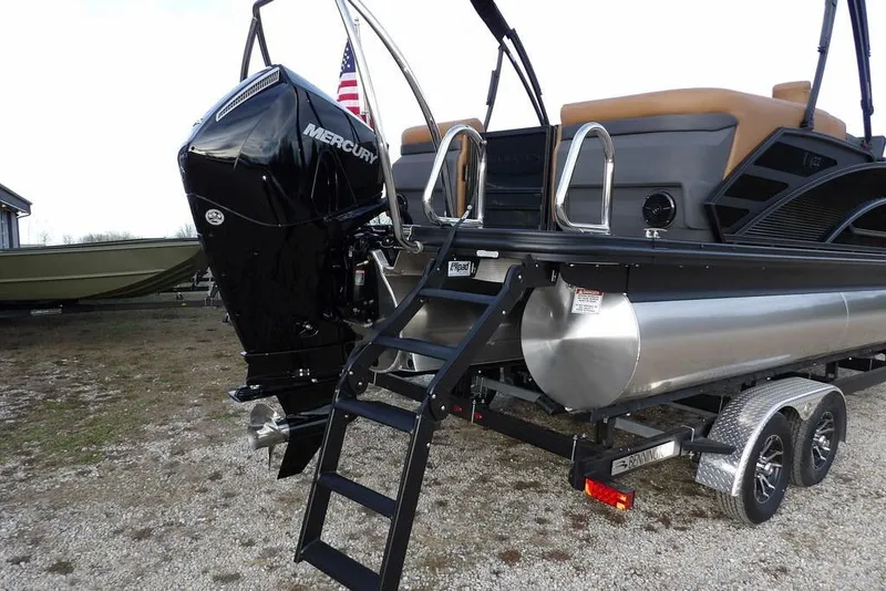 Slide: The Image of 2026 Bennington 22 MFB pontoon boat with Mercury outboard motor and trailer. - 40