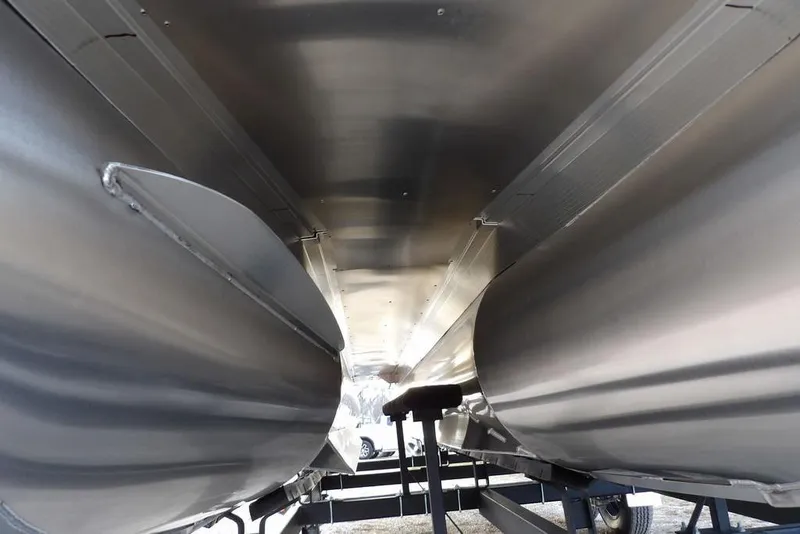 Slide: The Image of Underneath view of 2026 Bennington 22 MFB pontoon boat, showcasing sleek aluminum pontoons. - 45