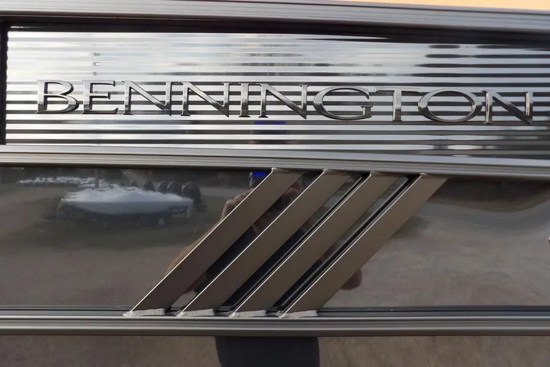 Slide: The Image of Bennington 22 MFB 2026 model logo on sleek metallic surface. - 46