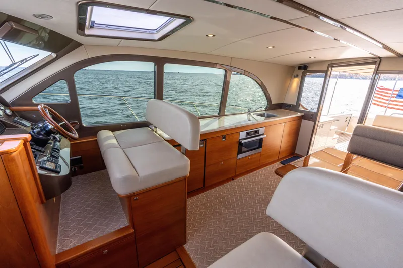 Slide: The Image of Luxurious interior of 2016 Palm Beach Motor Yachts PB50 with ocean view. - 44