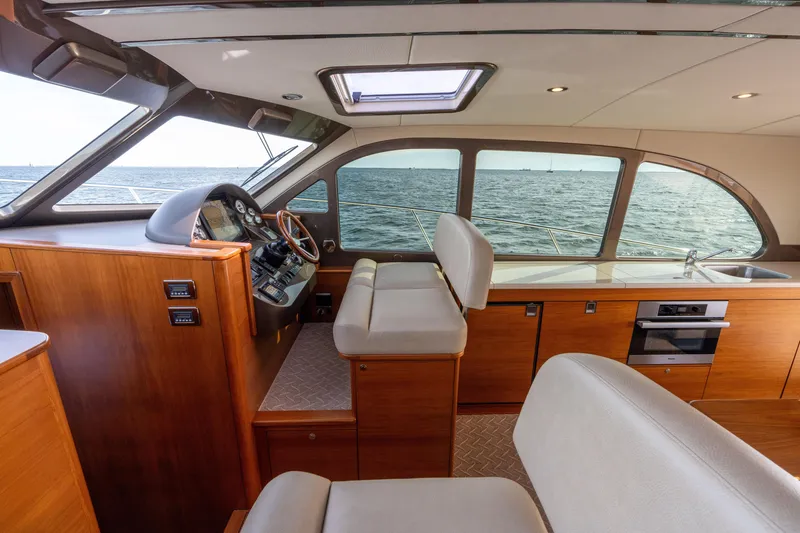 Slide: The Image of Bow view of 2016 Palm Beach Motor Yachts PB50 on calm waters. - 23
