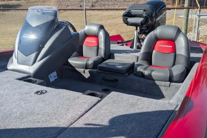 Slide: The Image of 2025 Tracker Pro Team 175 TXW Tournament Edition boat interior with dual seats and console. - 5