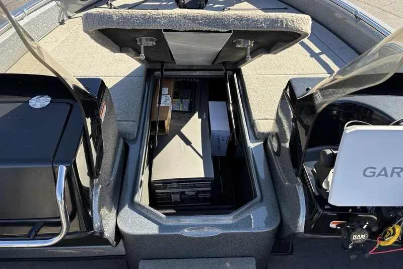 Slide: The Image of 2019 Nitro ZV19 boat storage compartment with Garmin equipment and accessories. - 17