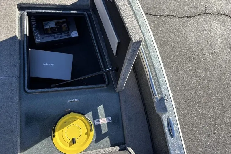 Slide: The Image of Open storage compartment in 2019 Nitro ZV19 boat with Garmin equipment inside. - 20