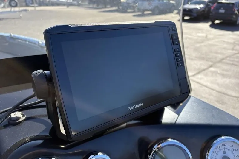 Slide: The Image of Garmin GPS device on 2019 Nitro ZV19 boat dashboard in sunny outdoor setting. - 23