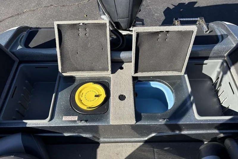 Slide: The Image of 2019 Nitro ZV19 boat storage compartments with open lids and visible interior features. - 34
