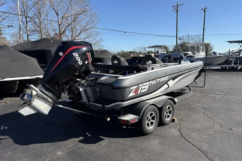 Slide: The Image of 2019 Nitro ZV19 boat with powerful 200 horsepower engine on trailer. - 4