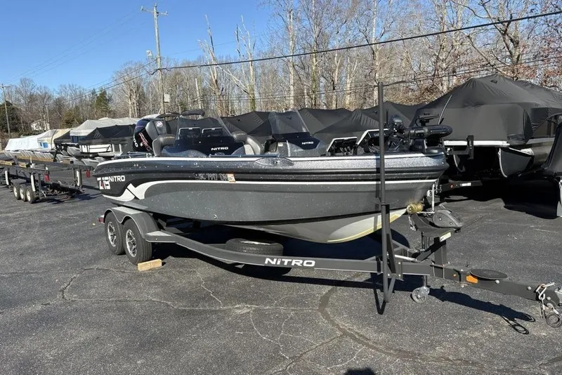Slide: The Image of 2019 Nitro ZV19 boat on trailer in outdoor storage area. - 6