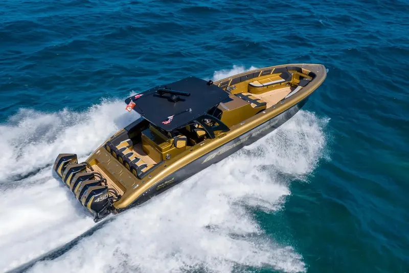 Slide: The Image of 2023 Midnight Express 43 Open boat cruising on blue ocean waters. - 1