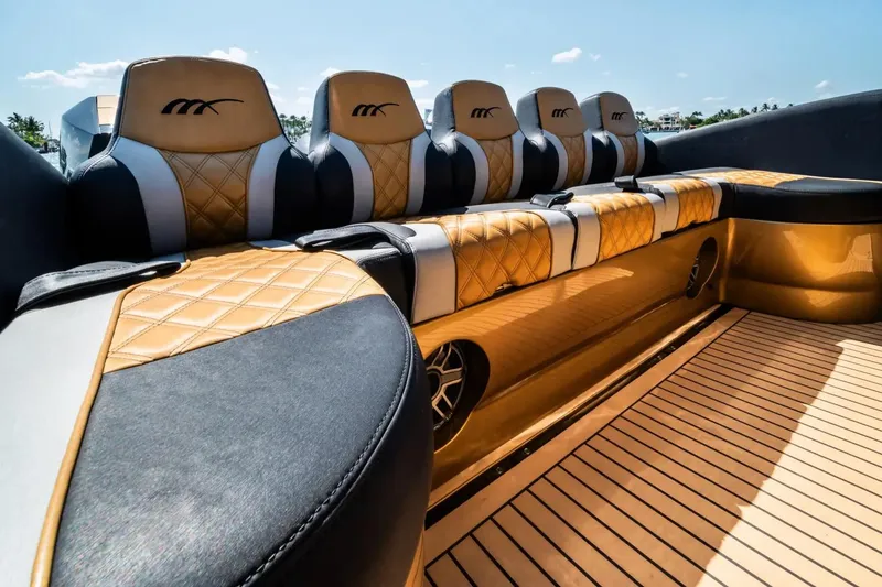 Slide: The Image of Luxurious seating on 2023 Midnight Express 43 Open boat with elegant design and premium materials. - 11