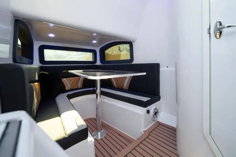 Slide: The Image of Luxurious interior of 2023 Midnight Express 43 Open boat with elegant seating and table. - 12